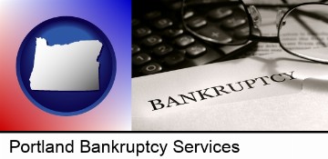 a bankruptcy notice letter with calculator and eyeglasses in Portland, OR