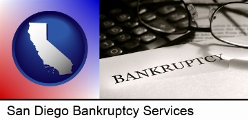 a bankruptcy notice letter with calculator and eyeglasses in San Diego, CA